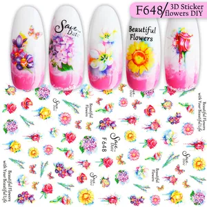 Dettaglio degli adesivi 3D F648 con rose e girasoli ad acquerello sulle unghie