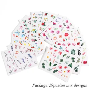 Set of 29 nail art water slide decals featuring floral, flamingo, and butterfly designs