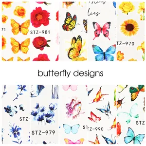 Dettaglio di vivaci farfalle e fiori su adesivi per nail art con scivolo d'acqua