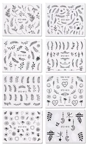 Detail view of 8 sheets nail art stickers featuring black floral and leaf patterns