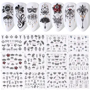 Close-up of gothic floral nail art stickers with vintage roses and mandala patterns