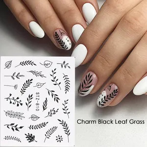 Water decal nail art stickers with black leaf patterns and botanical designs for manicure