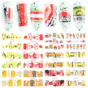 Détail de 12 autocollants à ongles motifs fruits tropicaux et géométriques sur fond blanc
