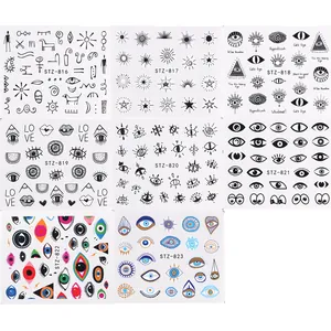 Detailed sheet showing eye and star nail art stickers in black and colorful designs