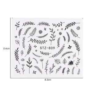 Minimalist black floral nail art water stickers featuring leaves and botanical designs