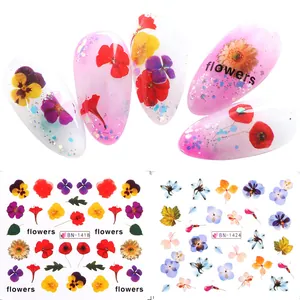 Detailed view of colorful floral nail water sliders showing BN-1418 and BN-1424 designs