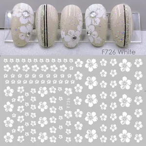 Detail of F726 white 3D floral nail art stickers with delicate flower patterns