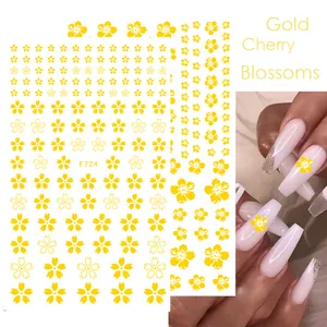 Detail of gold cherry blossom nail stickers F724 with 3D floral patterns on nails