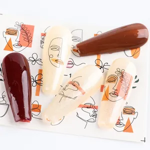 Abstract face line art and geometric nail art stickers in burgundy and brown tones