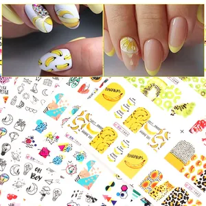 Autocollants nail art aux fruits et lignes abstraites avec motifs banane et kiwi