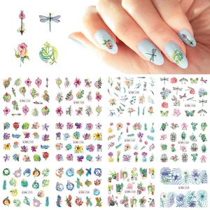 Set of 12 nail art stickers with watercolor flowers and butterflies on light blue nails