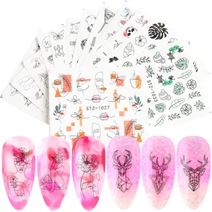 Minimalist nail water decals featuring artistic face line art and floral patterns