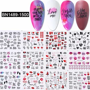 Detail of 12 nail water decals featuring red lips, Russian text and floral motifs