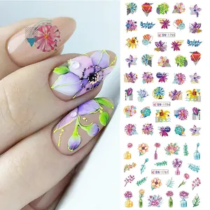 Floral nail art stickers with colorful spring designs and water slide decals for DIY nails