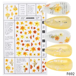 F692 nail art stickers with yellow floral patterns and artistic French short phrases
