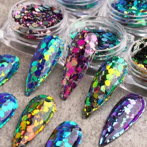 Irregular hexagonal laser nail sequins showing chameleon color shift on almond fake nails