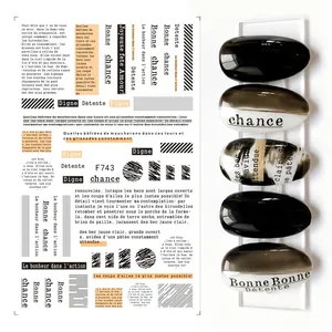 Detail of F743 3D nail art stickers with French text and black abstract line patterns