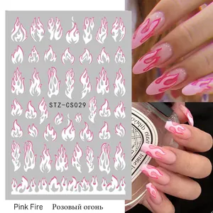 Dettaglio di adesivi nail art fiamme rosa e bianche ed effetto sulle unghie