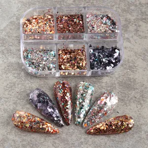 Macro detail of iridescent heart and star nail glitter flakes in a 6-grid storage case