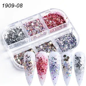 Irregular nail art glitter set with 6 compartments showing diverse sequins on white tips