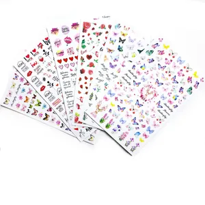 Set di adesivi per nail art con farfalle colorate, rose e scritte decorative