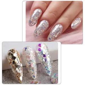 Detail of holographic nail glitter flakes in heart and star shapes for nail art