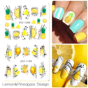 Dettaglio di adesivi per unghie con motivi tropicali di ananas e limone con linee nere