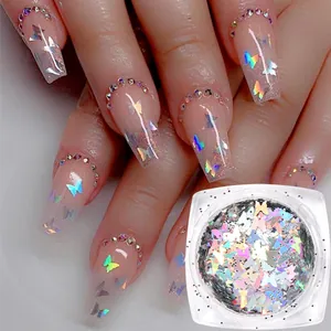 Macro detail of butterfly shaped iridescent laser sequins on long transparent nails