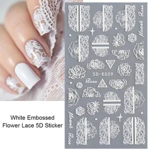 Detailed view of 5D white embossed lace flower nail stickers with 3D floral textures