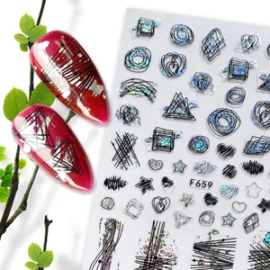 Detail of F659 3D nail sticker featuring black geometric lines and holographic glitter