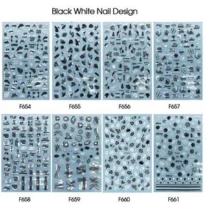Detail view of 3D black and white nail art stickers featuring leaf and line patterns