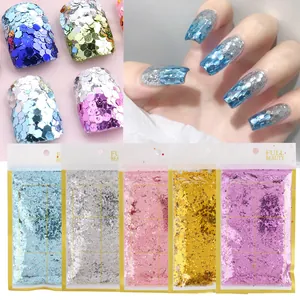 Dettaglio di paillettes esagonali miste per nail art in vari colori scintillanti