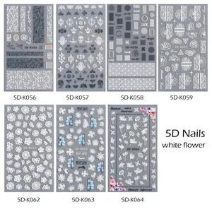5D embossed nail art stickers set featuring white lace flowers and classic patterns