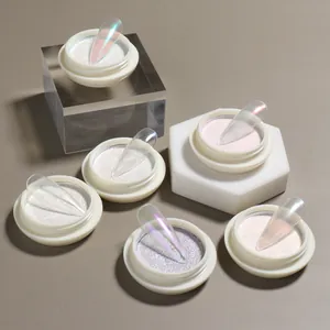 Detail view of 6 Aurora nail powder jars showing iridescent chrome finish on long tips