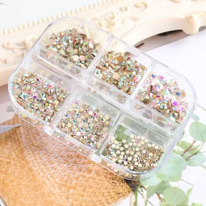 Detail of 6-grid box containing assorted sizes of AB crystal glass nail art rhinestones