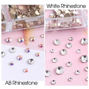 Close-up of 6-grid box with AB and white glass rhinestones for nail art DIY