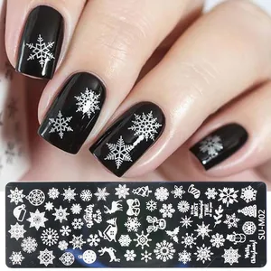 Detail of Christmas nail stamping plate SU-M02 featuring snowflakes and reindeer patterns