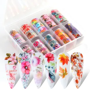 Detailed view of 10 rolls of floral nail art foil stickers in a clear storage case
