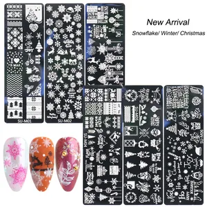 Christmas nail art stamping plates set with snowflakes, reindeer and winter patterns