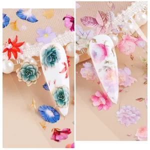 Detailed view of floral nail transfer stickers featuring roses and succulents on white tips