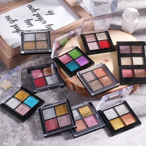 Macro view of 4-color solid aurora nail powder palette with metallic glitter finish