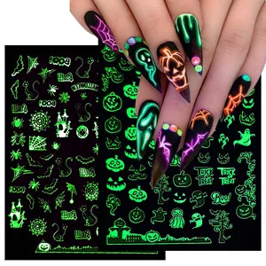 Adesivi per unghie luminosi di Halloween con motivi di ragnatele e zucche fluorescenti