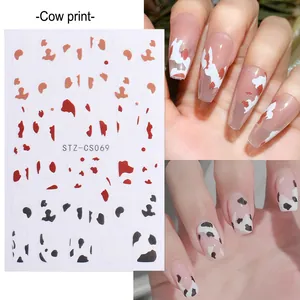 Pegatinas clásicas de uñas con estampado de vaca en marrón y negro para manicura moderna