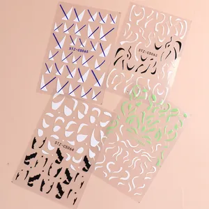 Vue à plat de stickers à ongles 3D avec motifs géométriques et lignes ondulées