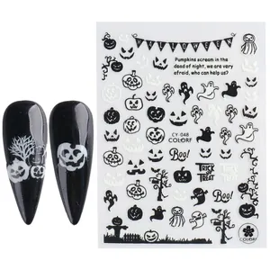 Adesivi per unghie Halloween luminosi con ragni e zucche su modelli di unghie nere