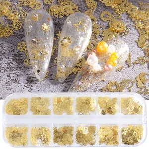Kit de décorations d'ongles de Noël avec flocons et rennes dorés en boîte de 12 cases