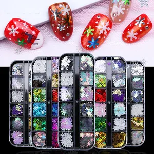 Macro detail of laser snowflake nail glitters in storage boxes with Christmas manicure effect