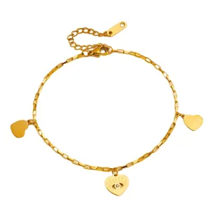 Bracelet double cœur doré avec breloque œil protecteur et maillons rectangulaires