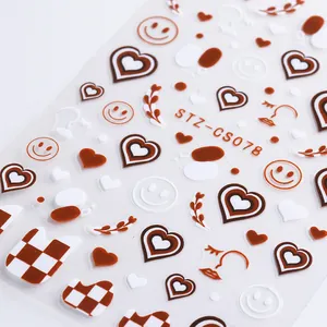 3D relief nail art stickers featuring checkerboard, hearts, and faces in wine red tones