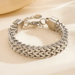 Polished stainless steel triple-row link chain bracelet with lobster clasp and tag